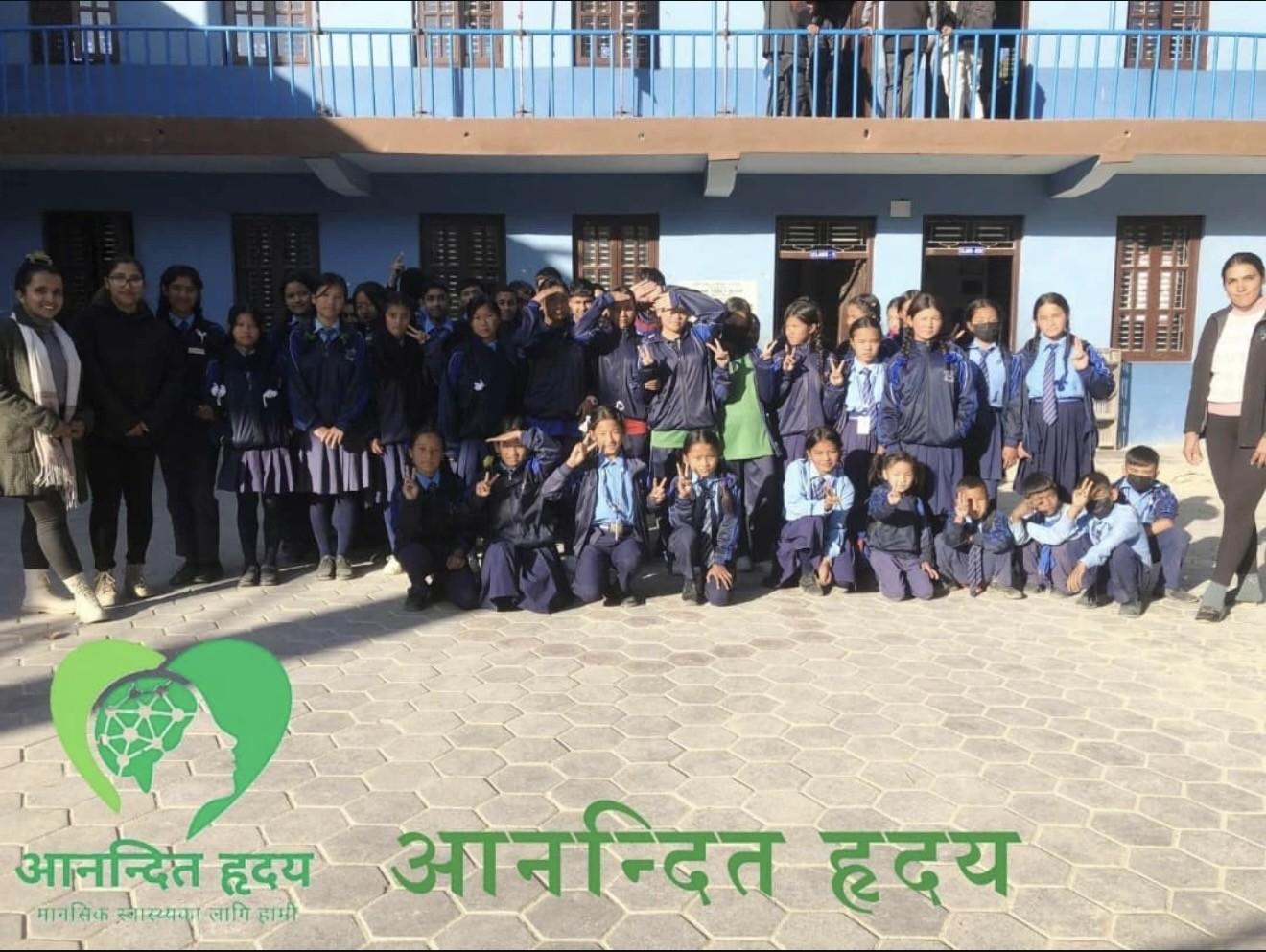 Students and facilitators at a school mental health program