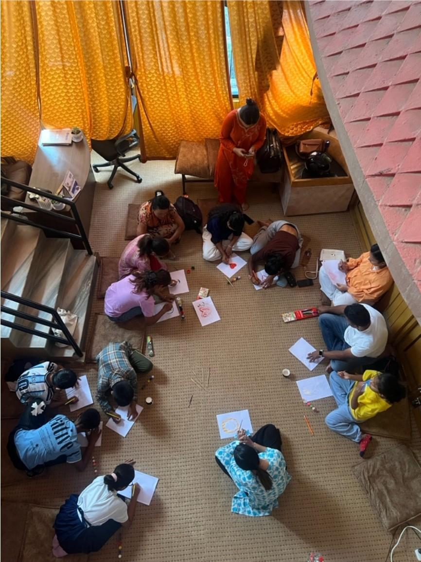 Children and caregivers in a hands-on child development workshop